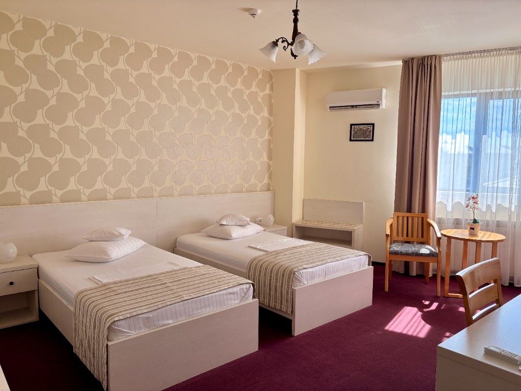 Cameră twin RIX Rooms — două paturi single